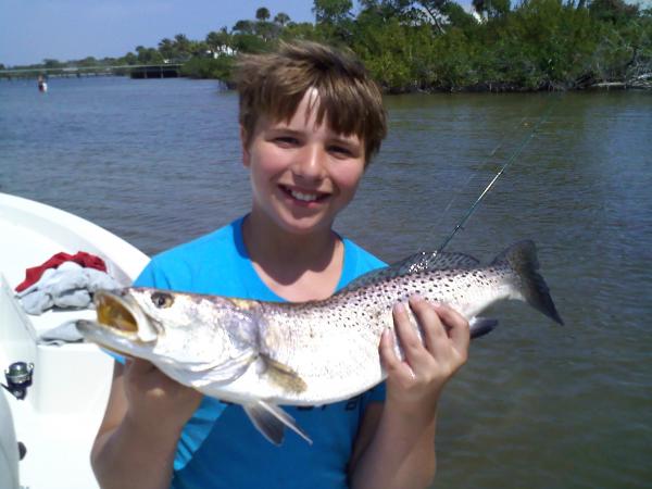 boy with big trout